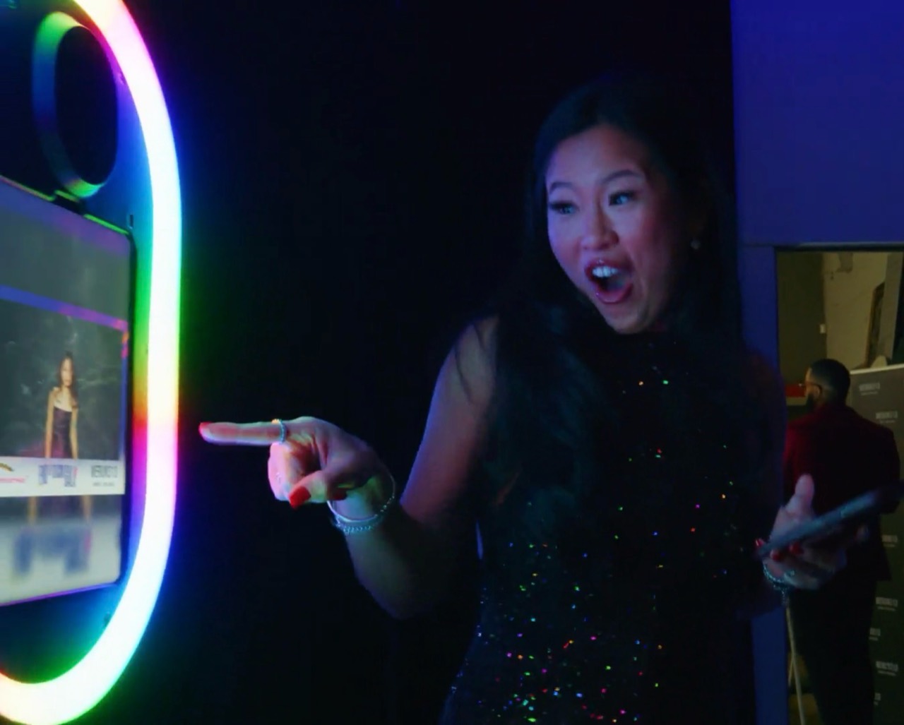 A guest reacting to the Black Pepper Booth at a Detroit event